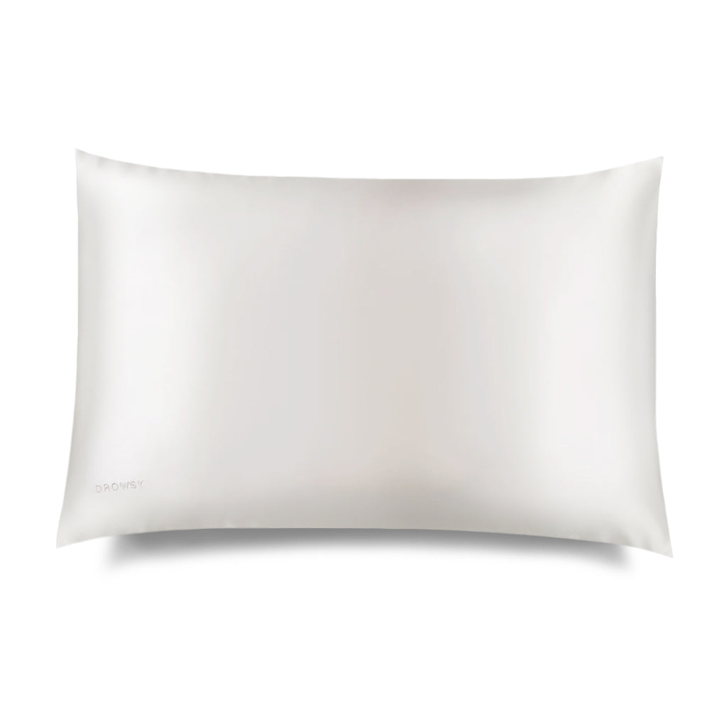 The Akoya Pearl Silk Pillowcase (King Size) by us.drowsysleepco—a smooth, white, rectangular silk pillowcase for skin and hair care—is shown on a plain white background with the brand's name subtly printed in light gray on the lower left corner.