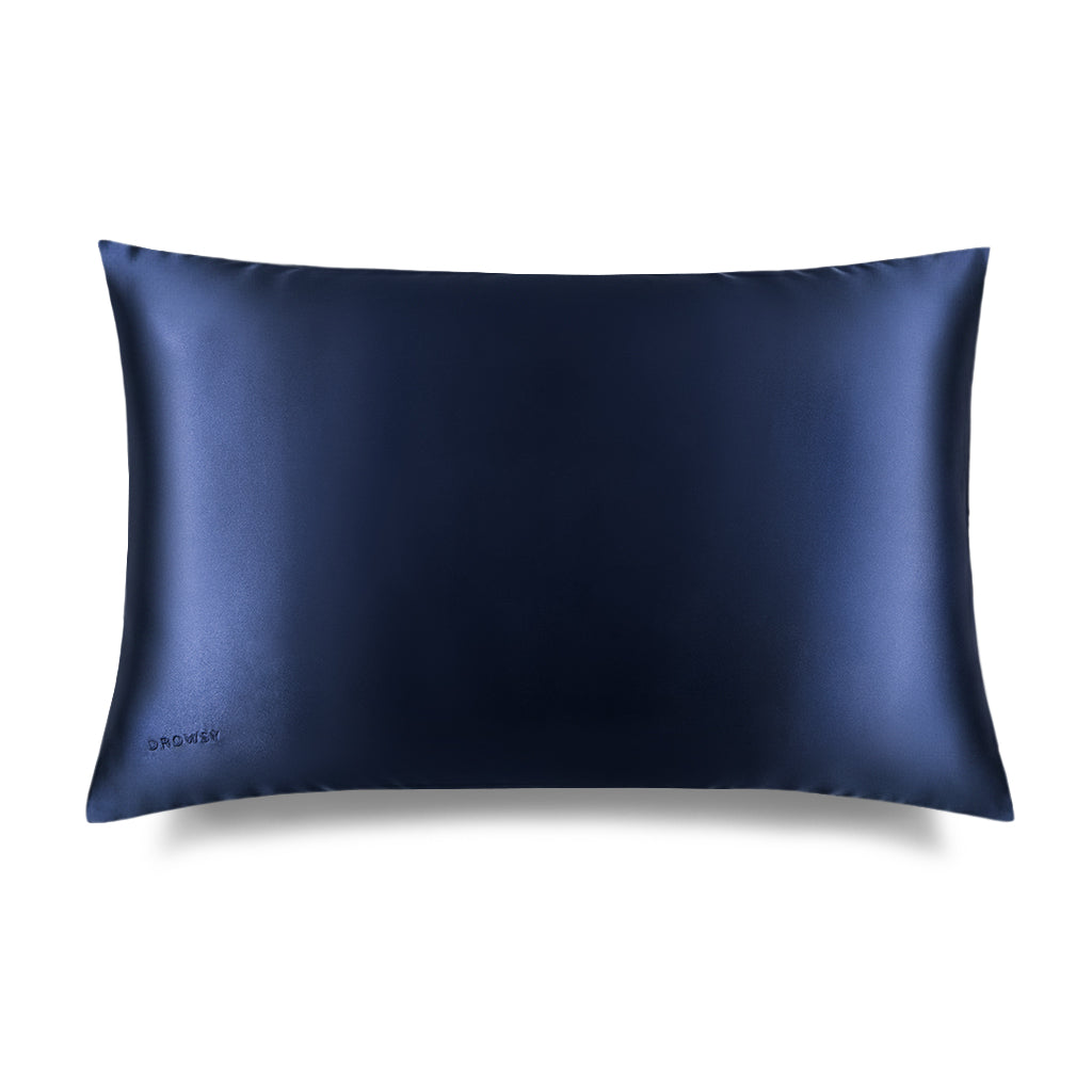 The us.drowsysleepco Midnight Blue Silk Pillowcase features a rectangular, dark blue design with a subtle logo—ideal for skincare, beauty routines, and protecting hair. Shown on a white background.