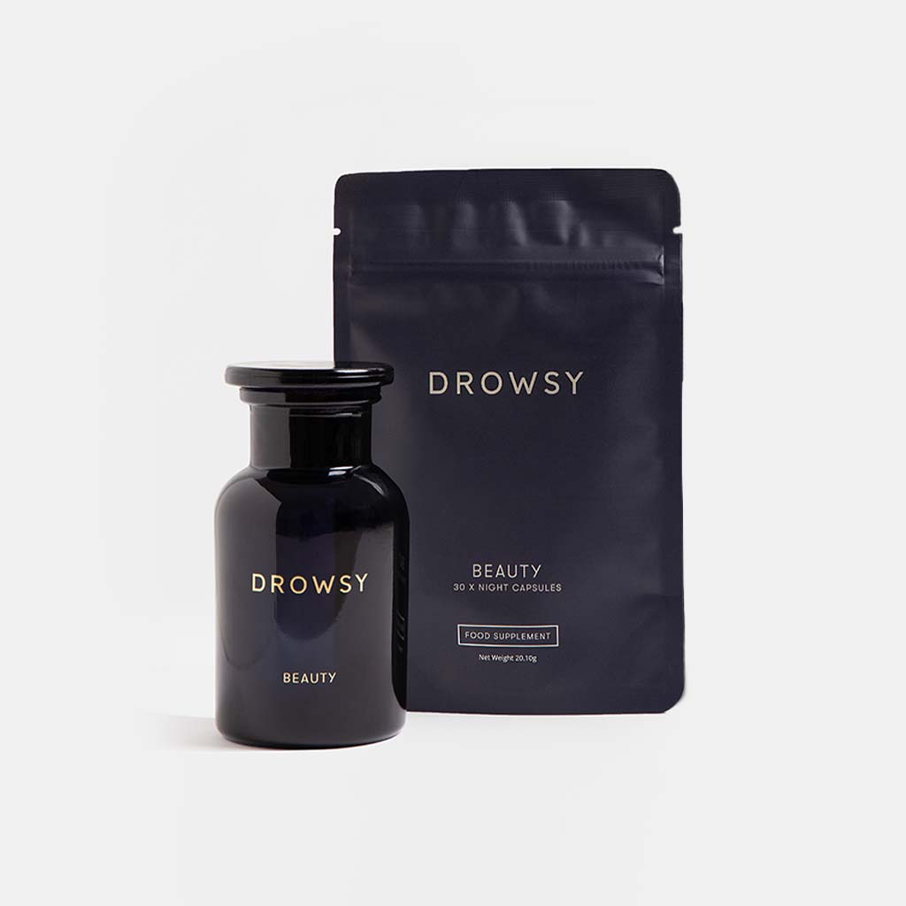 A dark glass jar and a matching resealable pouch labeled drowsysleepco Supplements - Beauty are displayed on a plain white background. These skin supplements support collagen synthesis for a youthful complexion.