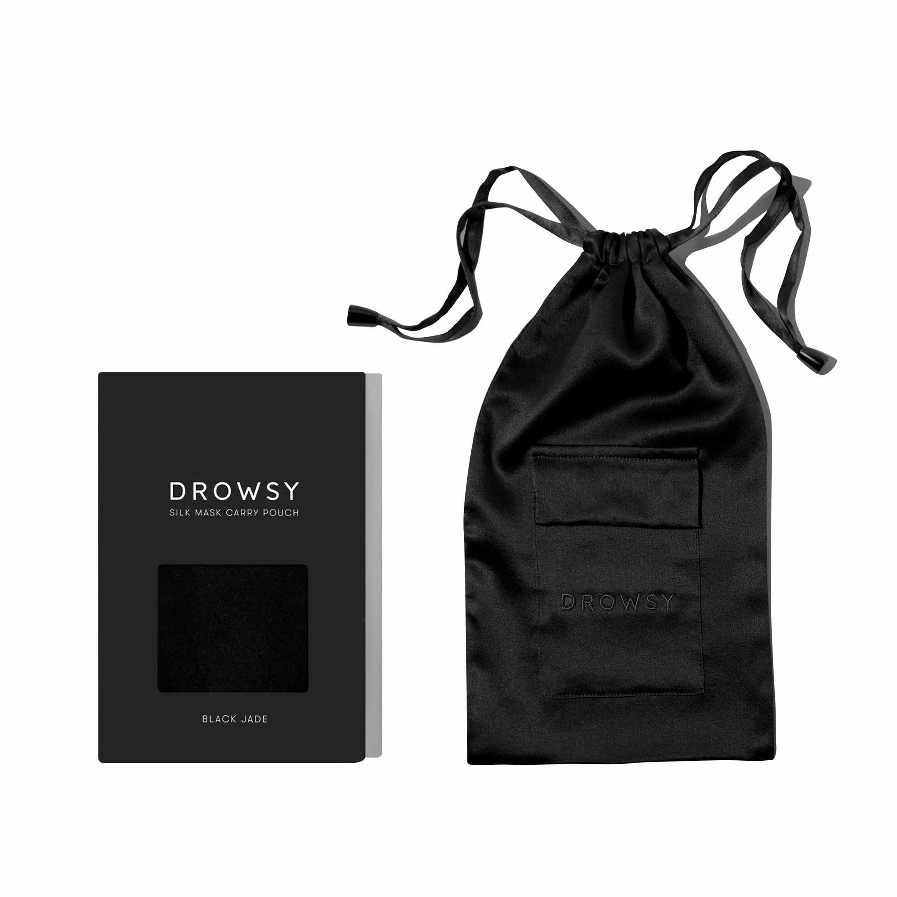 A black silk mask carry pouch with drawstrings sits next to its matching Black Jade box from drowsysleepco’s “Drowsy is the new black bundle,” part of the Beauty Sleep Collection and labeled Drowsy Silk Mask Carry Pouch—Black Jade.