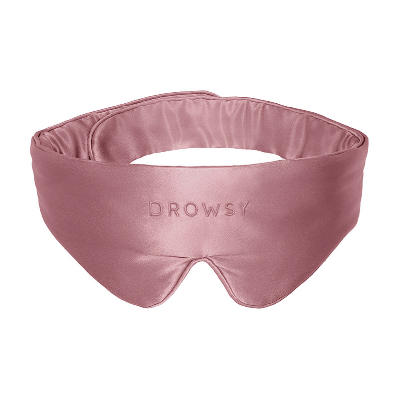 Introducing the Featherweight Silk Eye Mask Damask Rose by us.drowsysleepco—a luxurious pink mulberry silk sleep mask, beautifully embroidered with DROWSY on the front and showcased against a crisp white background. The perfect accessory for restful nights.