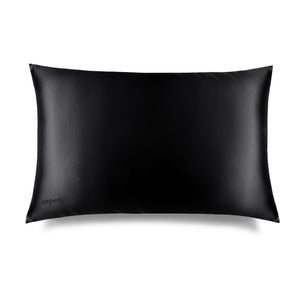 The Black Jade Silk Pillowcase by us.drowsysleepco is a rectangular black silk pillowcase with a smooth, shiny finish, shown on a white background. "DROWSY" is subtly embossed in the lower left—a beauty essential gentle on skin and hair.