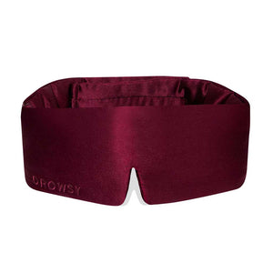 La Vie En Rouge by us.drowsysleepco is a dark red silk eye mask with “DROWSY” embossed on the front. Its contoured shape and center notch ensure total blackout and comfortable, uninterrupted beauty sleep.