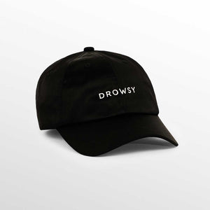 The Drowsy Silk Cap - Black Jade by Drowsy features DROWSY embroidered in white on the front, making it a stylish choice for outdoor workouts or sunny days. Shown against a plain white background.