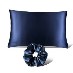 The Perfect hair bundle Midnight Blue by drowsysleepco features a navy silk pillowcase and a matching Silk Padded Scrunchie, both shown on a white background.
