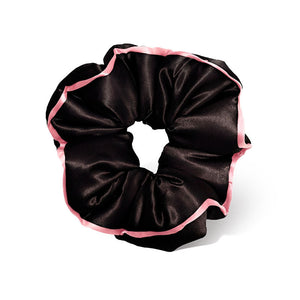 The drowsysleepco Sleep and the City Black Padded Scrunchie features black satin with a pink trim, displayed on a white background.